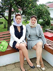 Elegant older whore posing undressed on camera