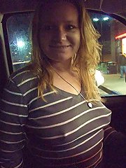 Lewd mature babe spreading her pussy on photo