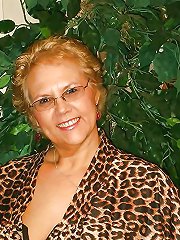 Mature female getting naked